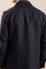 Muški komplet od crne lanene jakne s patentnim zatvaračem i smeđih hlača, elegantni ležerni ljetni outfit